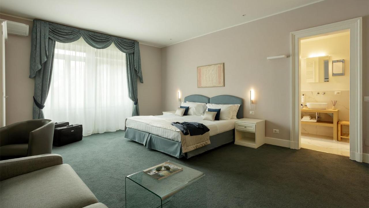 Camin Hotel Луино Екстериор снимка